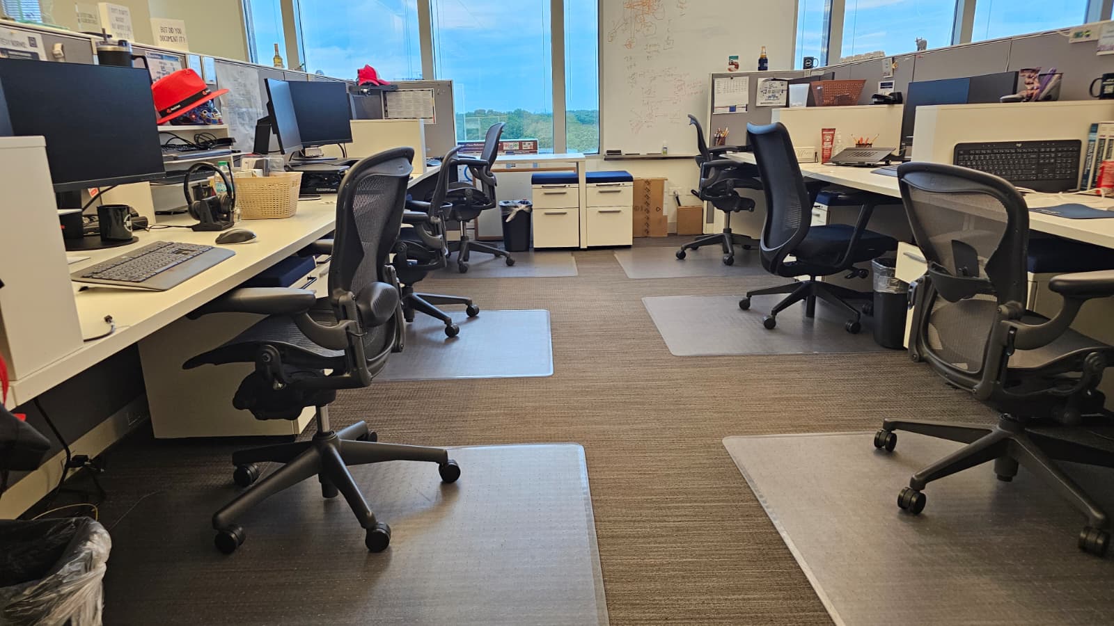 MPLOY open-plan office with ergonomic chairs and city views